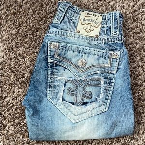 Kasper Slim Boot jeans.